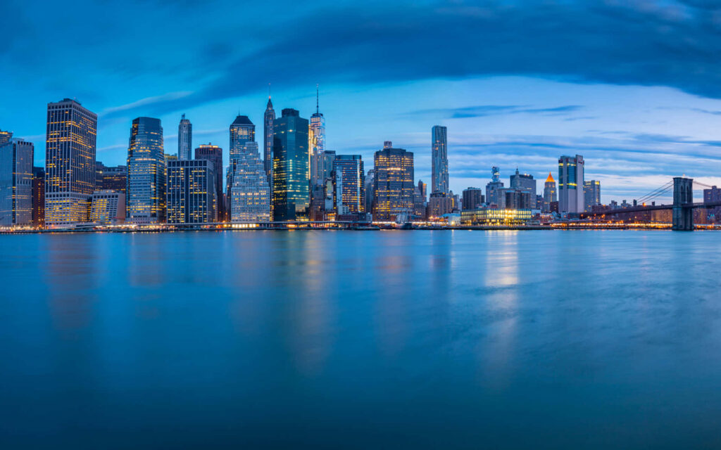 Stunning NYC Skyline at Dusk: Serene Wallpaper Background