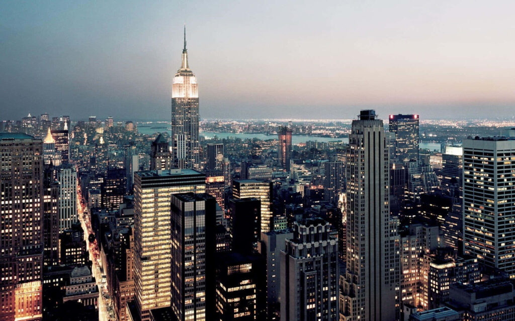 Illuminated NYC Skyline Wallpaper with Iconic Skyscrapers