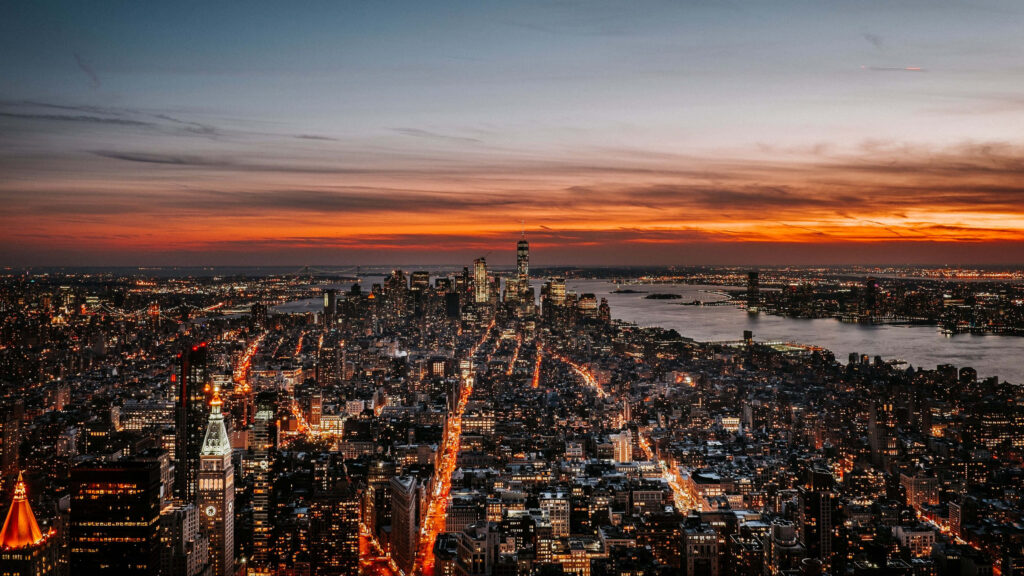 Stunning NYC Skyline Night Wallpaper: Illuminated Skyscrapers & Sunset