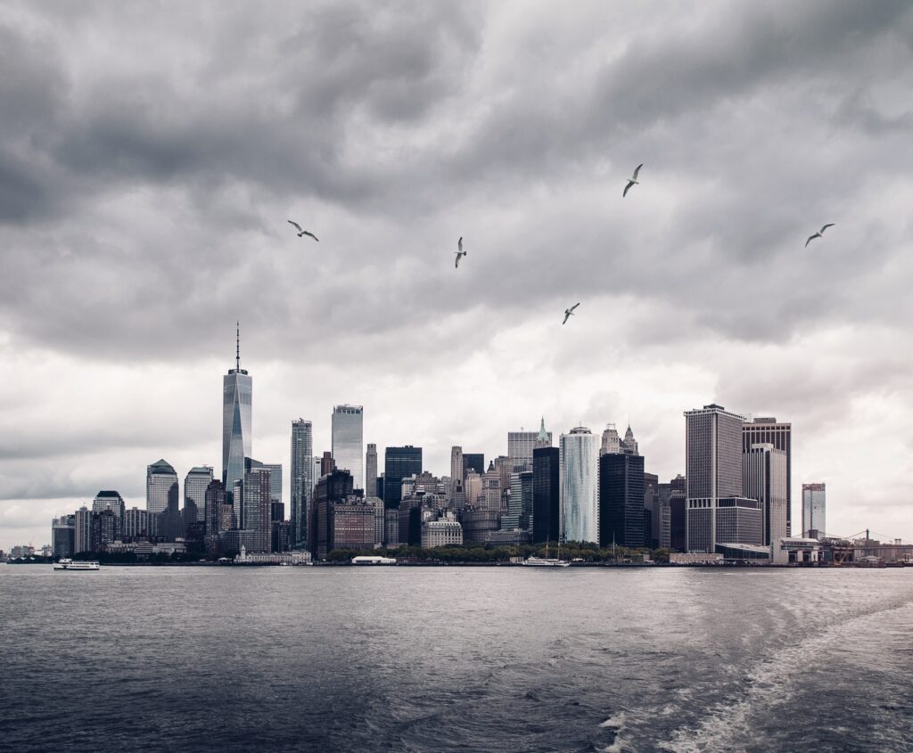 Stunning NYC Skyline Wallpaper: Iconic Skyscrapers & Overcast Sky