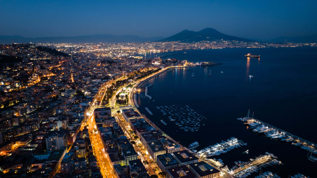 Night Aerial View of Naples: Illuminated City & Mount Vesuvius Wallpaper