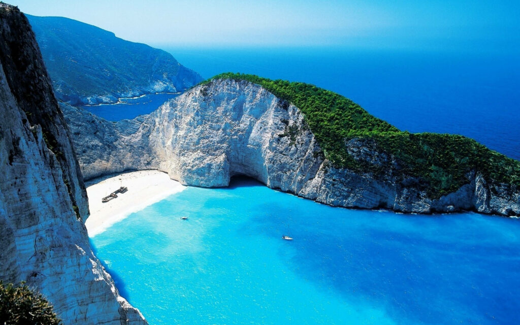 Navagio Beach Wallpaper: Turquoise Waters & Stunning Cliffs View