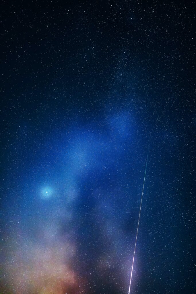 Mesmerizing Nebula Wallpaper: Starry Night with Vibrant Cosmic Hues