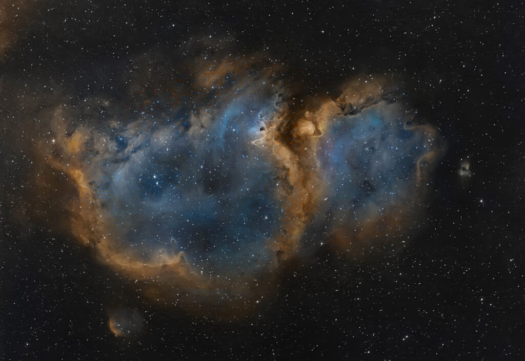 Stunning Nebula Wallpaper: Vibrant Blue & Orange Cosmic Background