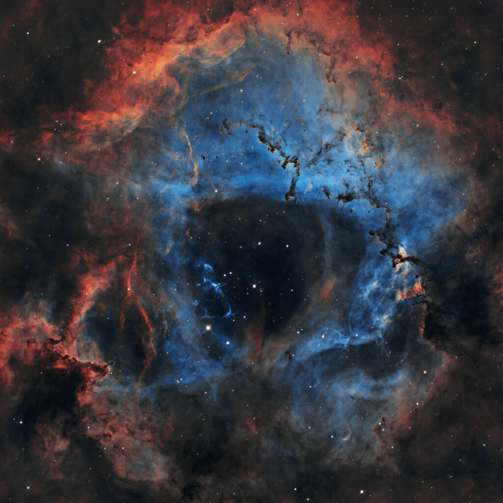 Mesmerizing Nebula Wallpaper: Vibrant Blue & Red Cosmic Beauty