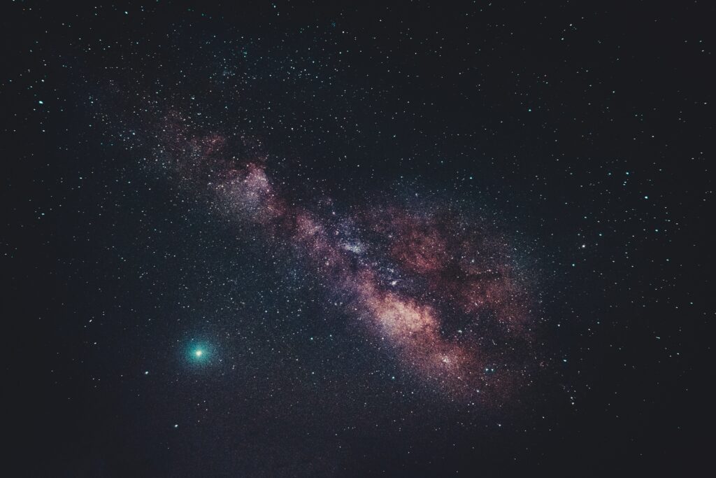 Vibrant Nebula Wallpaper: Stunning Cosmic Scene with Starry Sky