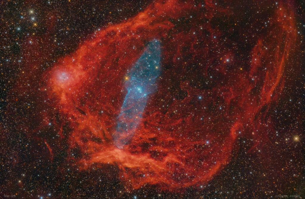 Stunning Nebula Wallpaper: Vibrant Red and Blue Cosmic Background
