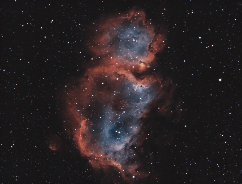 Stunning Nebula Wallpaper: Vivid Red and Blue Cosmic Beauty