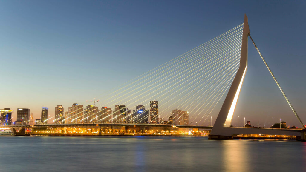 Stunning Netherlands City Lights Wallpaper: Erasmus Bridge Evening Glow
