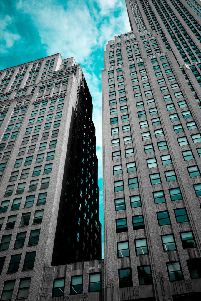 Skyscraper Wallpaper: Stunning NYC Architecture Against Cloudy Sky