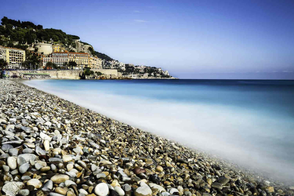 Stunning Nice, France: Pebbled Beach & Turquoise Waters Landscape Wallpaper