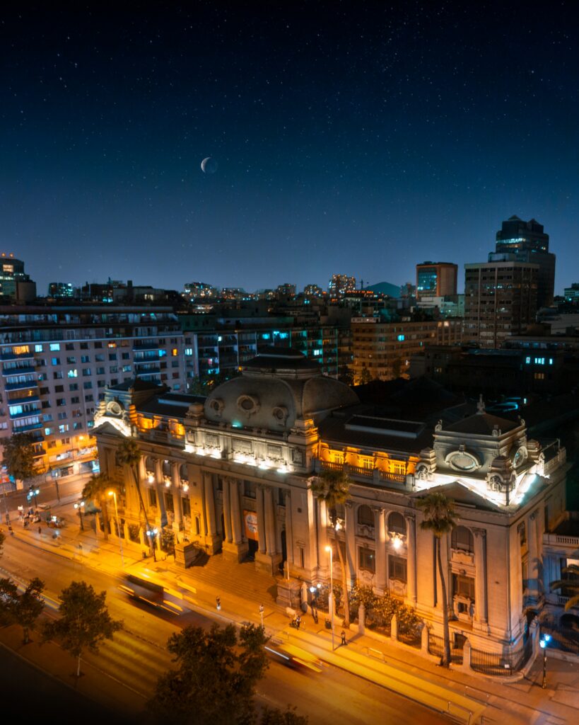 Stunning Night Cityscape Wallpaper: Historic Building & Modern Skyline