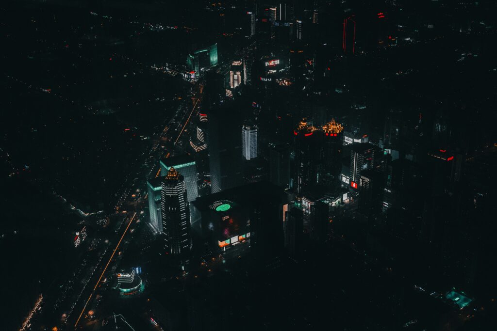 Stunning Night Cityscape Wallpaper: Illuminated Skyscrapers