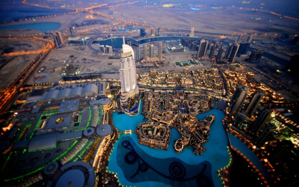 Stunning Night Cityscape Wallpaper: Aerial View of Illuminated Skyscrapers