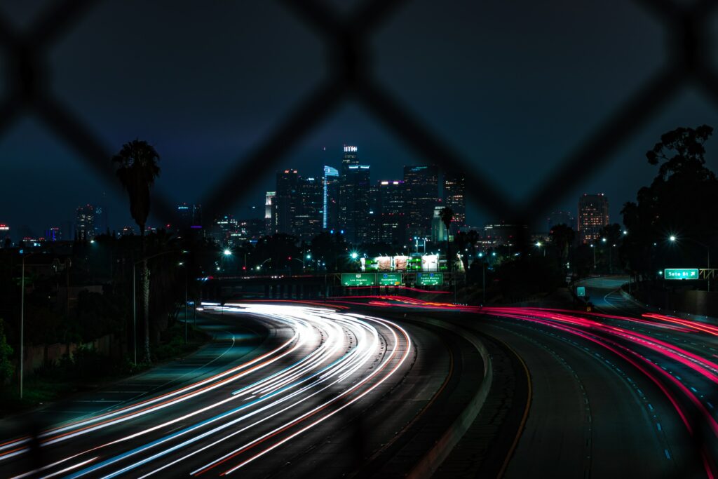 Stunning Long-Exposure Night Cityscape Wallpaper with Light Trails