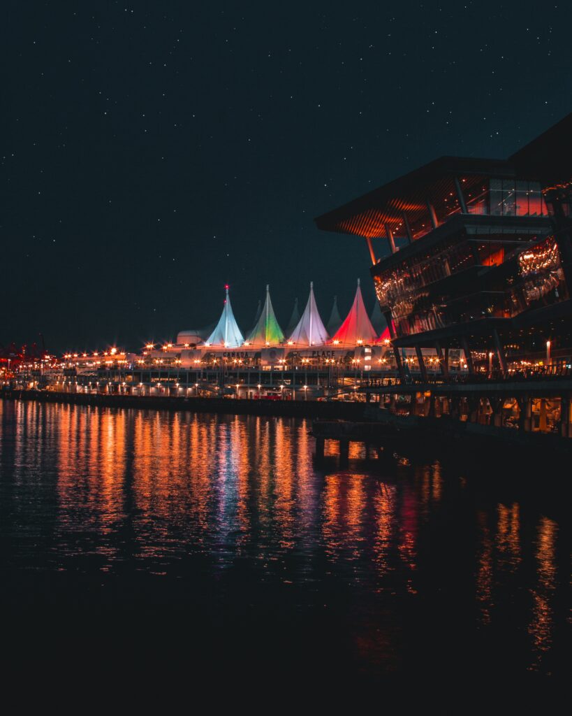 Stunning Night Cityscape Wallpaper: Vibrant Lights & Serene Reflections