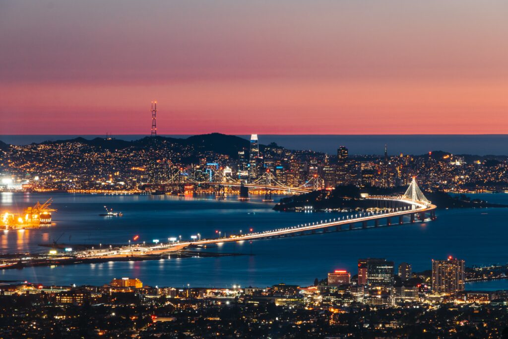 Stunning Bridge Night Cityscape Wallpaper with Colorful Sunset