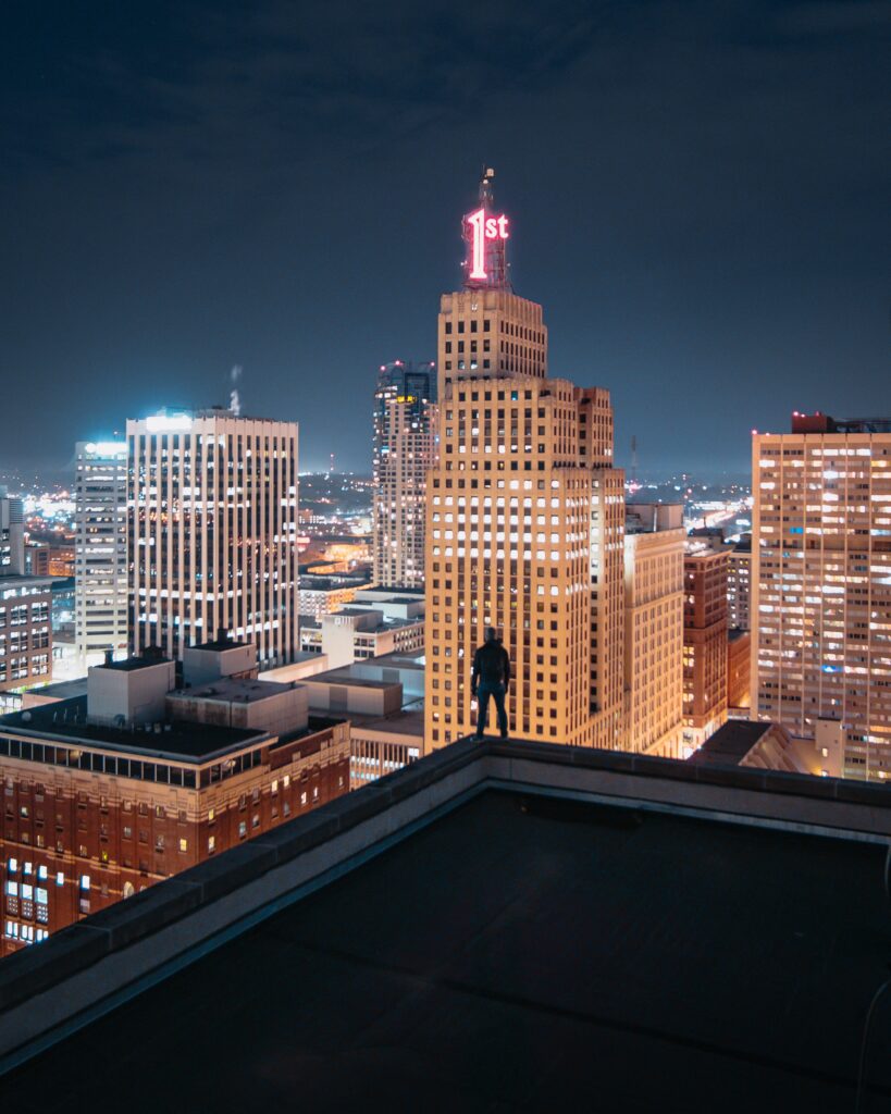Stunning Night Cityscape Wallpaper: Rooftop View of Glowing Lights