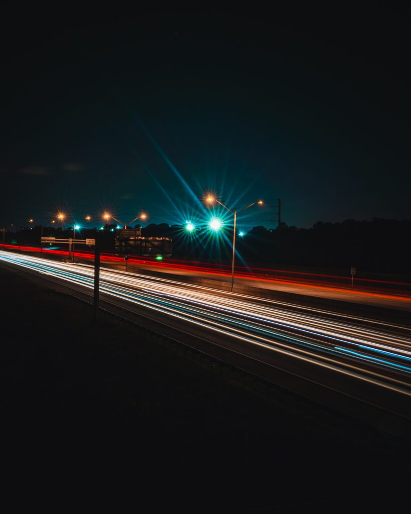 Stunning Night Road Wallpaper: Vibrant Light Trails & Streetlights