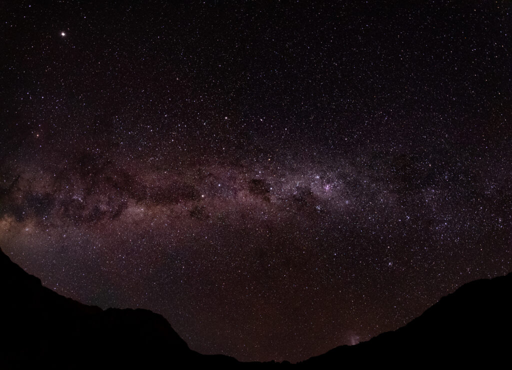 Stunning Night Sky Wallpaper with Stars and Mountain Silhouette