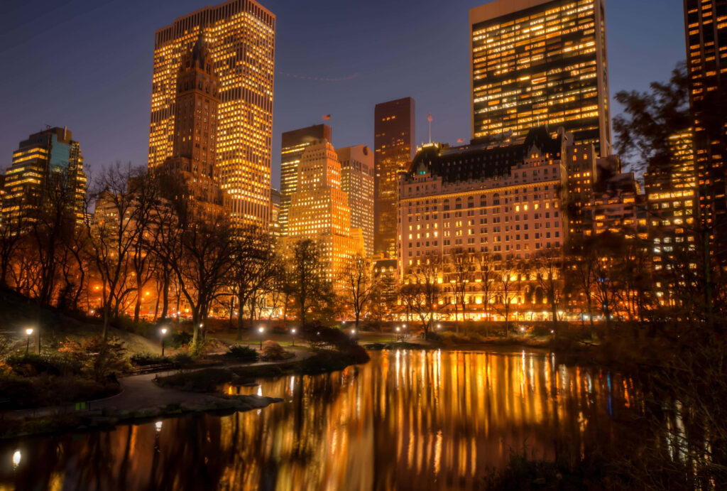 Stunning Night Skyline Wallpaper: Modern City Reflections & Glow