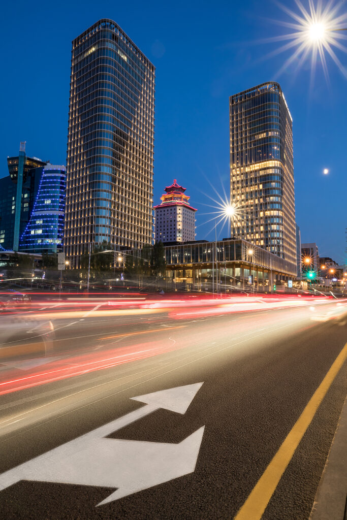 Vibrant Night Cityscape Wallpaper: Long Exposure Urban Energy