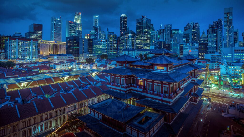 Stunning Wallpaper: Traditional Pagoda Meets Modern City Skyline