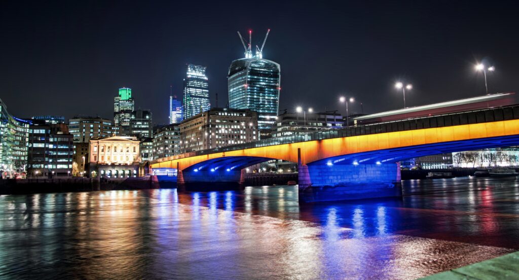 Stunning Nightscape Wallpaper: Bridge Reflecting on Calm River