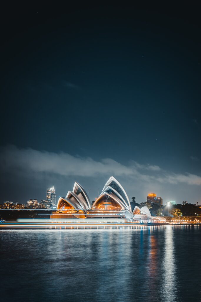 Stunning Nighttime Architectural Wallpaper with Urban Reflections