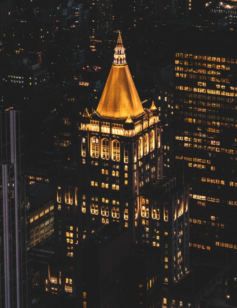 Stunning Aerial Night Cityscape Wallpaper with Golden Structure