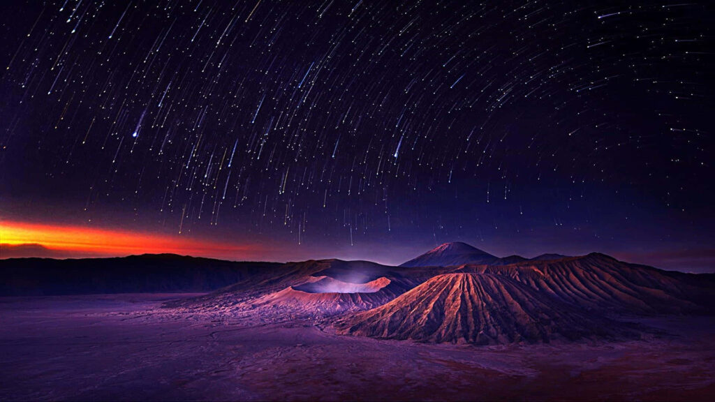 Stunning Nighttime Mountain Landscape with Vibrant Starry Sky Wallpaper