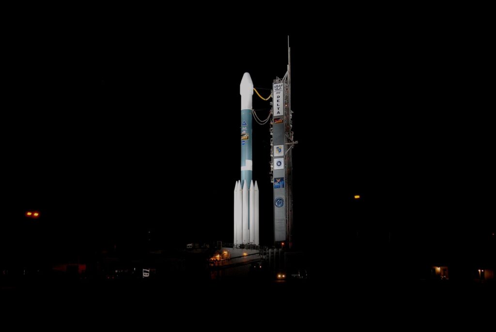 Stunning Rocket Cosmodrome Wallpaper: Nighttime Space Exploration