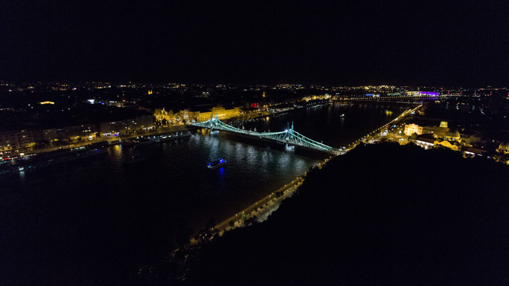 Stunning City Bridge Wallpaper: Serene Night Reflection Background