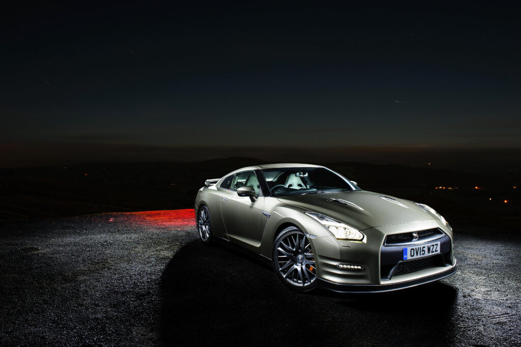 Nighttime Nissan GT-R Wallpaper: Sleek Design & Ambient Lighting