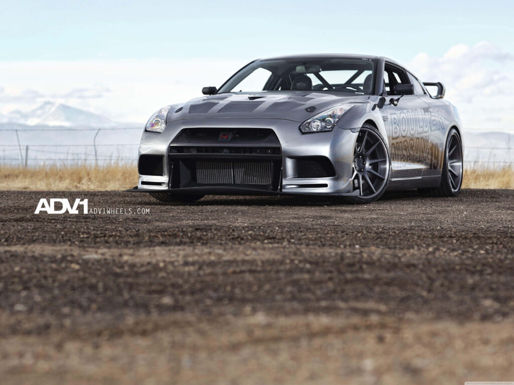 Sleek Silver Nissan GT-R Wallpaper with ADV.1 Wheels in Desert