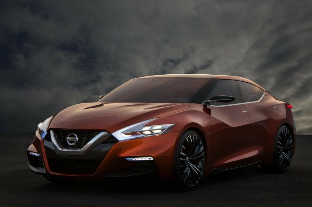 Stunning Nissan Sport Sedan Concept Wallpaper with Dramatic Background