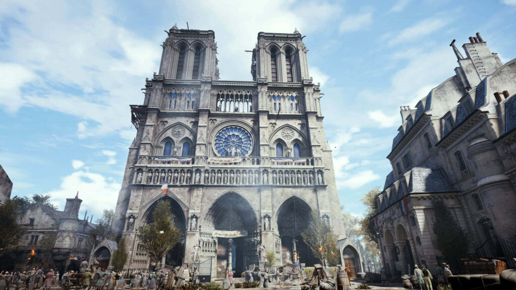 Magnificent Notre Dame Cathedral Wallpaper: Gothic Charm in Urban Setting