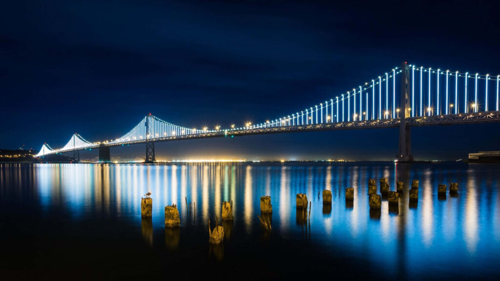 Oakland Bay Bridge Night Wallpaper: Captivating Blue Glow Background
