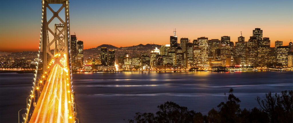 Vibrant Sunset Wallpaper: Oakland Skyline & Bay Bridge Reflection