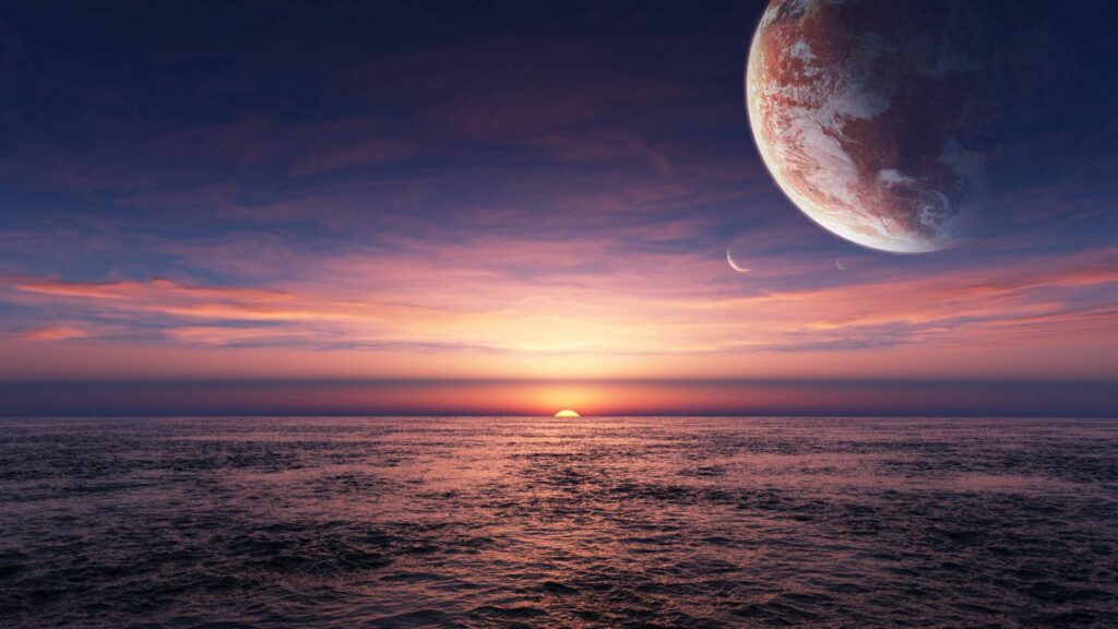 Breathtaking Ocean Sunset Wallpaper: Vibrant Sky with Planet & Moon