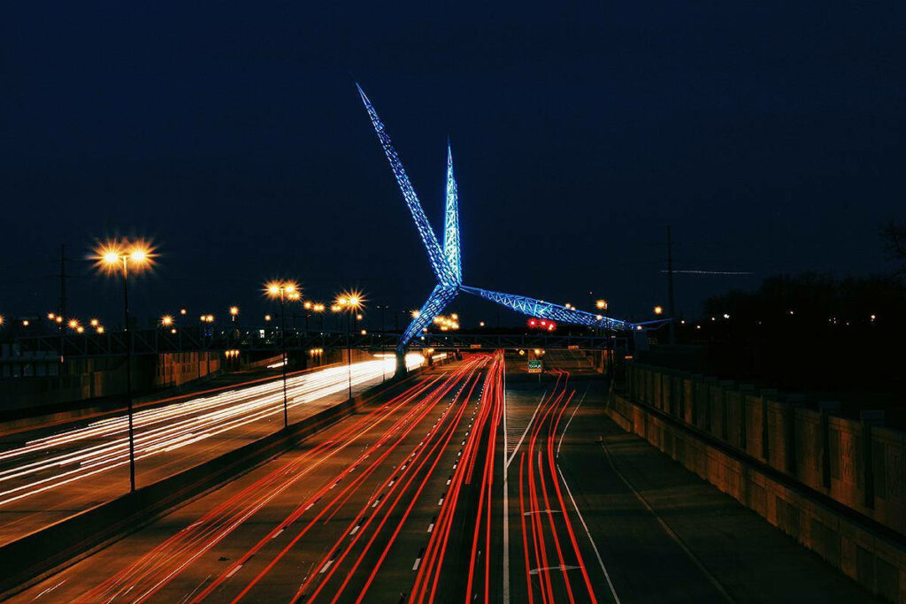 Stunning Night View of Oklahoma Skydance Bridge - Blue Lights Wallpaper