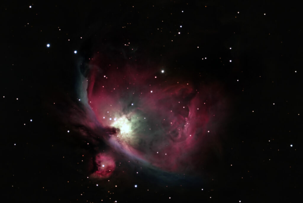 Stunning Orion Nebula Wallpaper: Colorful Galactic Clouds & Stars