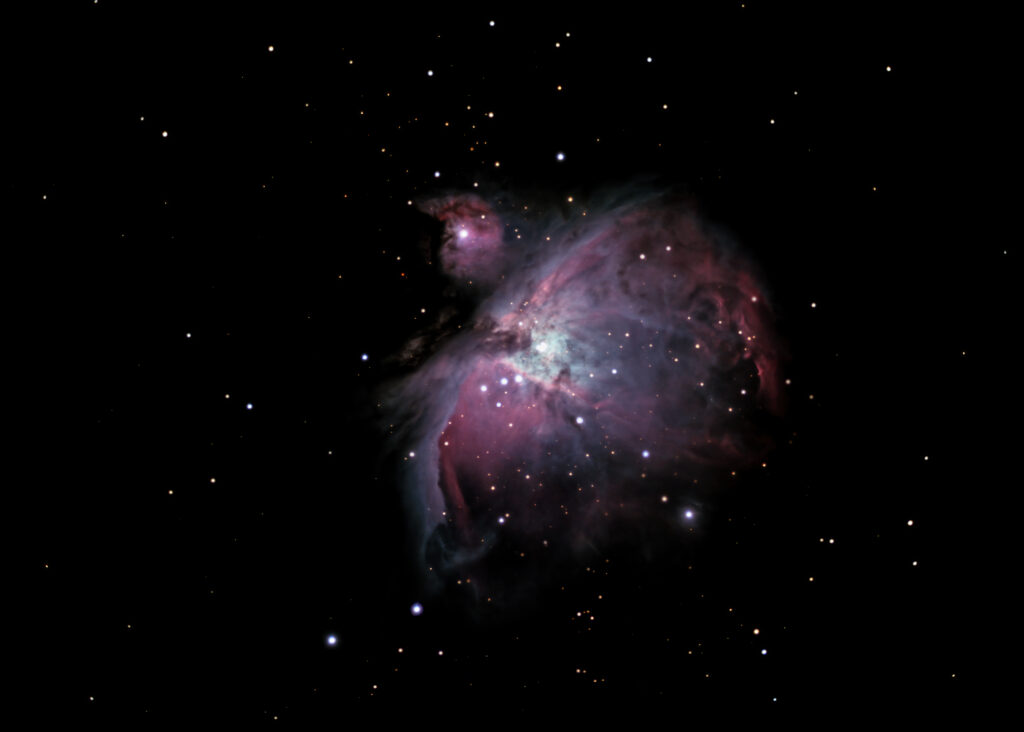 Stunning Orion Nebula Wallpaper: Vibrant Cosmic Background
