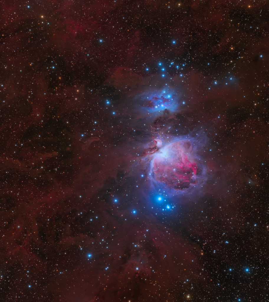 Stunning Orion Nebula Wallpaper: Vibrant Cosmic Scene Background
