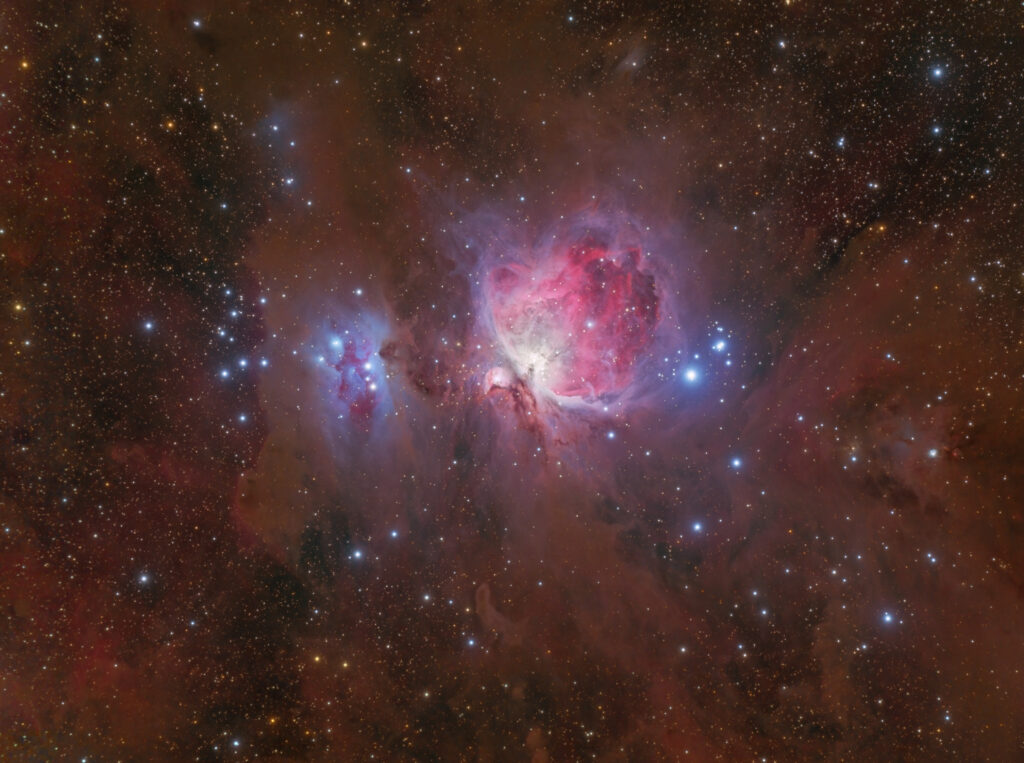 Stunning Orion Nebula Wallpaper: Vibrant Cosmic Formation Background