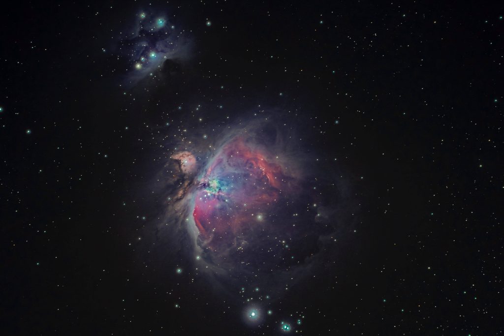 Orion Nebula and Running Man Nebula vibrant cosmic gas clouds in deep space astrophotography wallpaper