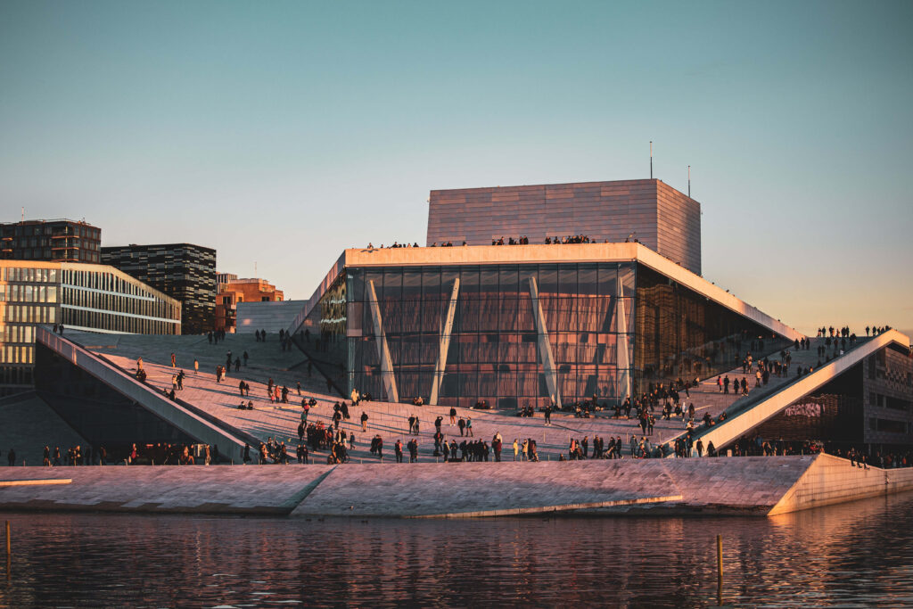 Oslo Opera House Sunset: Modern Architecture & Scenic Water View Wallpaper