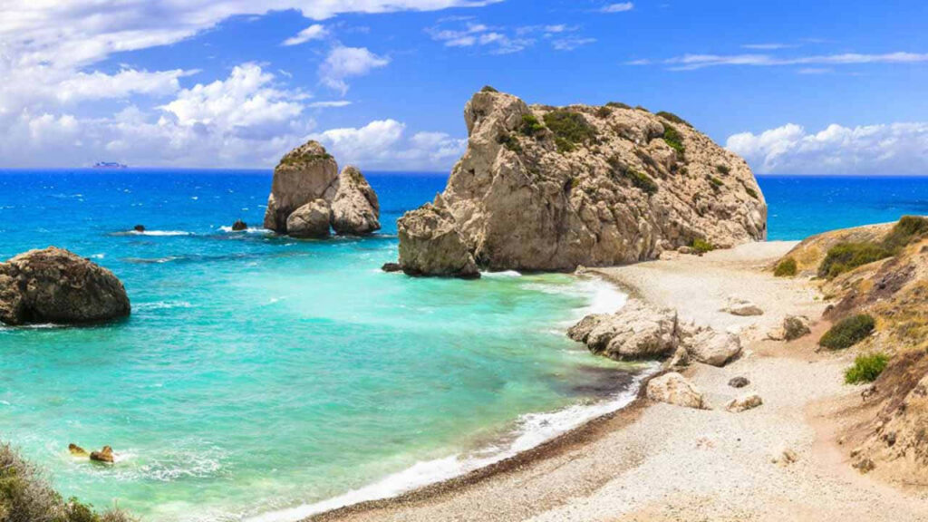 Paphos Beach Wallpaper: Turquoise Shoreline & Rock Formations Background
