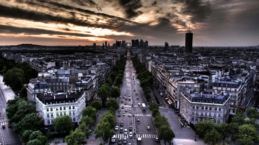 Stunning Paris Wallpaper: Elegant Architecture & Bustling Streets at Sunset