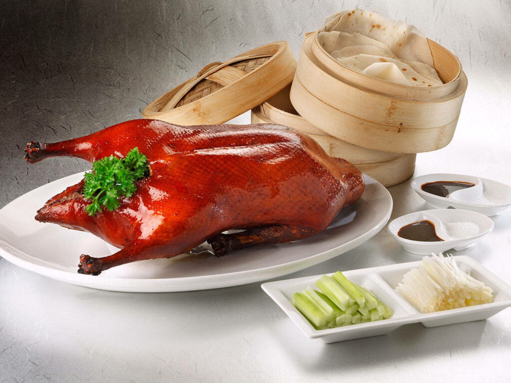 Stunning Peking Duck Platter Wallpaper: Roasted Duck & Fresh Garnishes